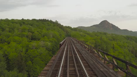 Aerial-low-angle-Onawa-trestle-bridge-railway-tracks