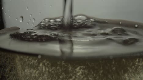 White-wine-pouring-into-a-glass-macro-shot