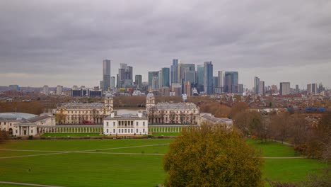 Timelapse-of-Canary-wharf-skyscrapers-behind-queens-house-greenwich-park-London