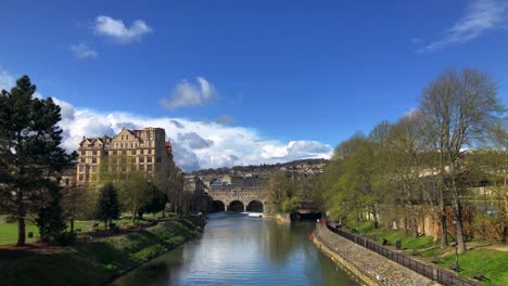 View-From-The-South-Of-Empire-Hotel-Near-The-Pulteney-Bridge-Over-The-River-Avon-In-Bath,-England---tilt-down,-revealing-shot