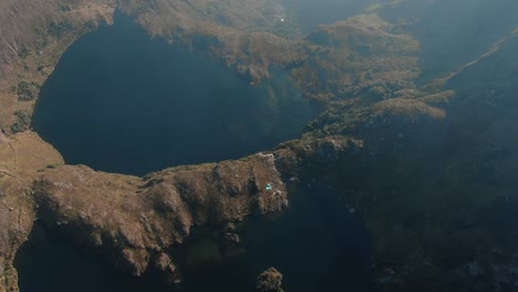 4k-aerial-drone-footage-over-the-first-two-lagoons-of-Pichgacocha-from-Ambo,-Huanuco,-Peru-in-the-Andes-mountains