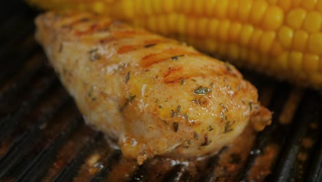 A-deliciously-seasoned-chicken-breast-in-a-hot-iron-grill-pan