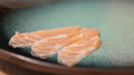 Three-Pieces-Of-Salmon-Sashimi-On-A-Plate