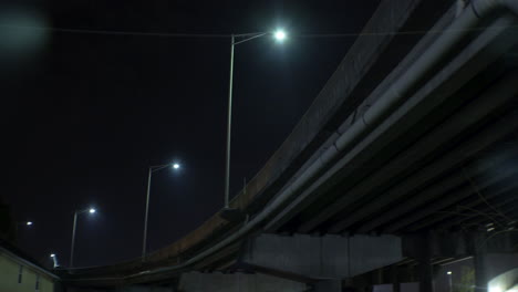 Street-Lights-on-the-Overpass-at-Night,-Rack-Focus,-Wide,-Anamorphic