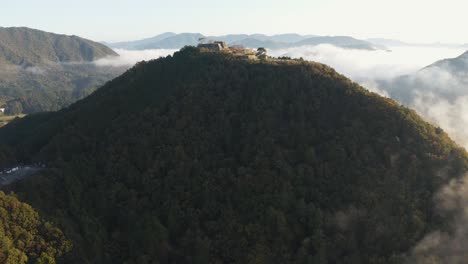 Takeda-Castle-Ruins,-Aerial-Tilt-Reveal-Ancient-Japanese-Location