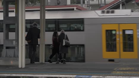 Passengers-On-Platform-Waiting-For-A-Train-At-Redfern-Train-Station---static-shot