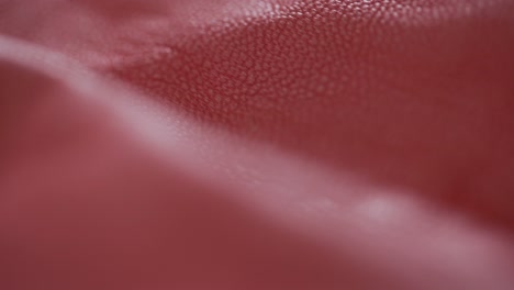 Closeup-Of-Raw-Leather-Fabric-In-A-Manufacturing-Factory,-Material-For-Fashion-Production