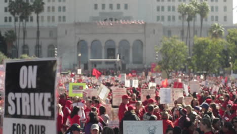 Rack-Focus,-Large-Crowd-in-Front-of-City-Hall-at-LAUSD-Teacher's-Strike