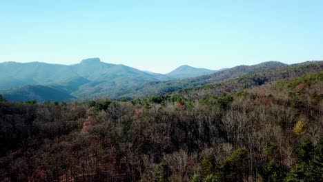 Aerial-Rise-from-Wilderness-Appoaching-Hawkbill-Mountain-and-Table-Rock-Mountain,-Hawksbill-Mountain-North-Carolina,-Hawksbill-Mountain-North-Carolina,-Table-Rock-Mountain-NC