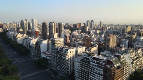 Dense-urban-Palermo-Libertador-Avenue-Buenos-Aires-urban-high-rise-skyline-aerial-dolly-left