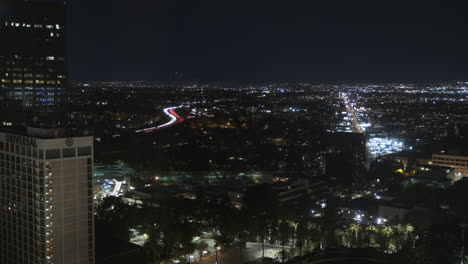 Night-Time-Lapse-of-Busy-Los-Angeles-Streets,-Traffic-Rushing-on-Lankershim-Boulevard-in-Universal-City