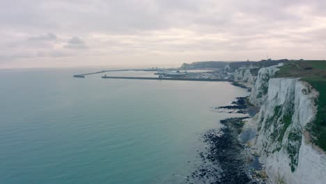 Aerial-drone-shot-along-white-cliffs-of-dover-towards-dover-harbour