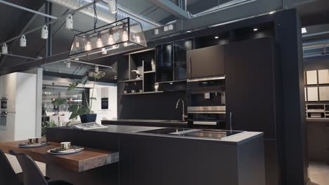 A-dark-kitchen-showroom-with-gimbal-shots