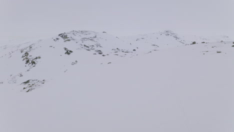 Aerial-View-Of-Snowy-Hardangervidda-Mountain-At-Winter-Season-Near-Haugastol,-Norway