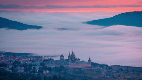 El-Escorial-monastery-during-sunrise-and-sea-of-clouds-timelapse