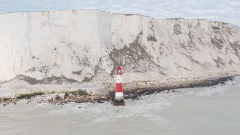 drone-shot-towards-red-white-beachy-head-light-house-White-cliffs-UK