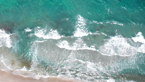 An-incredible-drone-shot-dropping-down-to-the-beach