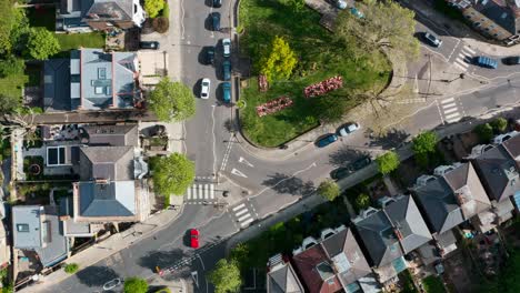 top-down-drone-shot-of-small-triangular-roundabout-UK