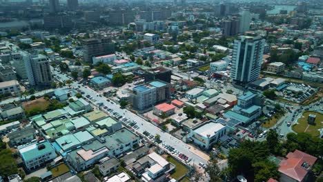 Victoria-Island-Lagos,-Nigeria---24-June-2021:-Drone-view-of-major-roads-and-traffic-in-Victoria-Island-Lagos-showing-the-cityscape,-offices-and-residential-buildings