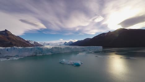Unique-time-lapse-of-Perito-Moreno-glacier-with-sun-flare-and-moving-clouds,-Argentine