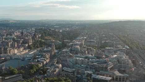 Wide-rising-drone-shot-of-Edinburgh-New-Town-West-End-at-sunset