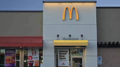 Mc-Donald's-Restaurant-reopening-of-dining-room-sign-after-the-covid-19-emergency,-end-of-lockdown-and-quarantine