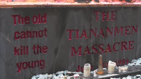 Sign-of-'The-Pillar-of-Shame'-to-remember-the-Tiananmen-victims-as-the-government-banned-the-annual-candlelight-vigil-at-Victoria-Park-marking-the-1989-Beijing-Tiananmen-Square-Massacre