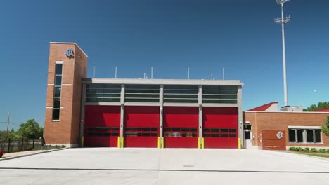 Daytime-Exterior-Establishing-Shot-of-Modern-Red-Brick-Fire-Station
