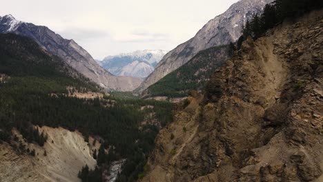 Aerial-drone-shot-flying-through-majestic-valley-near-Duffey-Lake-in-British-Columbia