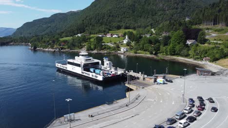 Ferry-Mf-Stavanger-from-Norled-company-arriving-port-of-Lavik-fully-loaded-with-cars-at-summer-day---road-E39-ferry-crossing-Norway-clip1