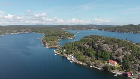 Exclusive-properties-on-private-island-in-Kragerofjorden,-Norway---drone-view