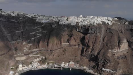 Karavolades-Stairs-climb-dramatic-cliff-face-from-Santorini-old-harbor
