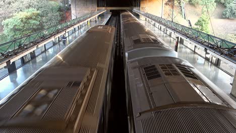 Metro-subway-wagons-departing-from-the-terminal-seen-from-an-upper-angle,-Sao-Paulo