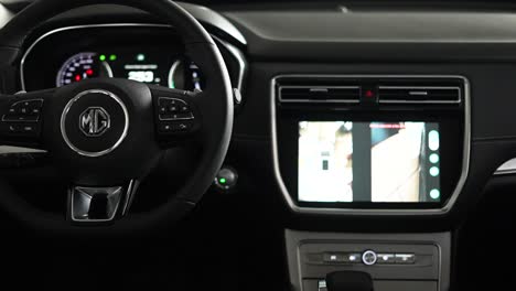 dash,-steering-wheel,-display-modern-car-radio-MG