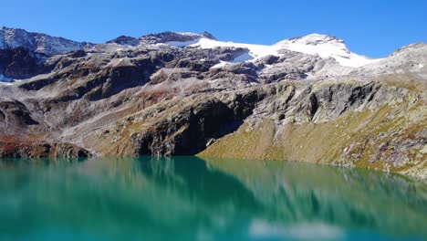 Rocky-Mountain-At-Tauern-National-Park-From-Weisssee-Lake-At-Daylight-In-Austria