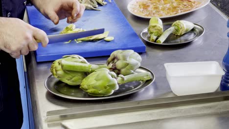 Cutting-artichokes-in-carpaccio-slights-by-professional-cook