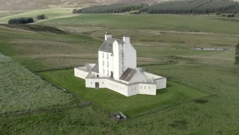Aerial-view-of-Corgarff-Castle-on-an-sunny-day,-Aberdeenshire,-Scotland
