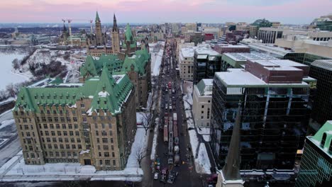 Drone-shot-of-Freedom-Trucker-Rally-on-Slater-Street-in-Ottawa,-Ontario-on-January-30,-2022,-during-the-COVID-19-pandemic