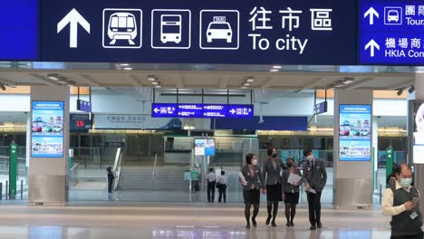 Passengers-arrive-at-Chek-Lap-Kok-International-Airport-in-Hong-Kong,-China