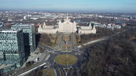 in-Bucharest-capital-city-of-Romania-drone-shooting,-flying-over-roads-and-Media-TV-center