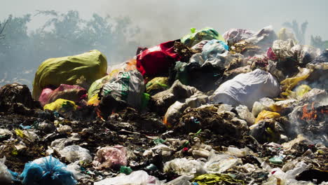 Air-pollution-by-illegal-burning-pile-of-plastic-trash-landfill-in-Vietnam