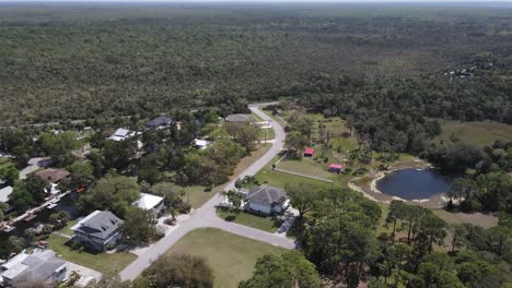 turning-from-the-coastal-marsh-of-the-Weeki-Wachee,-Florida-area-eastward-to-the-homes-and-canal-front-properties-of-the-Weeki-Wachee-River