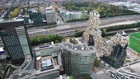Aerial-Pan-Flying-Over-Amsterdam-Zuidas-Financial-District-Past-The-Valley-Flat-Complex