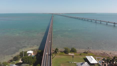 old-seven-mile-bridge-reopened-walking-biking-exercise-florida-keys-tropical-vacation-destination-travel-tourism-blue-water-sky-perfect-aerial-drone-trucking