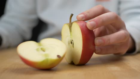 Cutting-an-apple-in-half