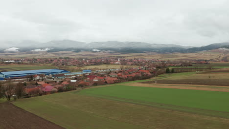 Low-flyover-above-farmland-around-commune-of-Sancraieni-in-Romania