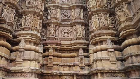 Stone-sculptures-with-sex-positions-for-education-at-Khajuraho-Temple,-UNSECO-World-Heritage-Site
