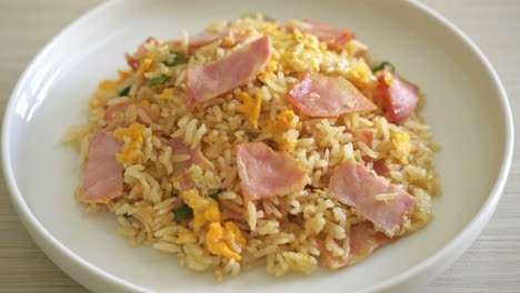 homemade-bacon-ham-fried-rice-on-white-plate