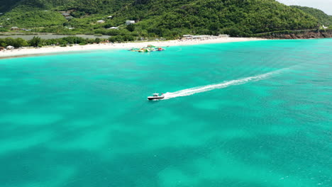 Drone-footage-of-motorboat-in-Antigua