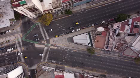 Aerial-top-down-of-vehicles-diverting-towards-different-lanes-from-intersection-at-Cordoba-Avenue-fork